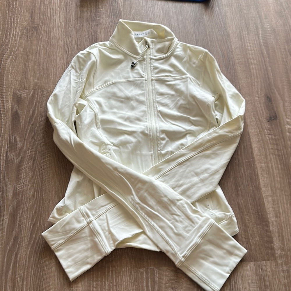 Lululemon size 2 light yellow running jacket